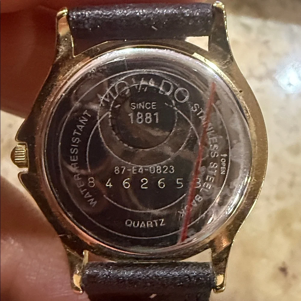 Authentic Women’s Vintage Movado Museum watch Gold face quartz crystal movement